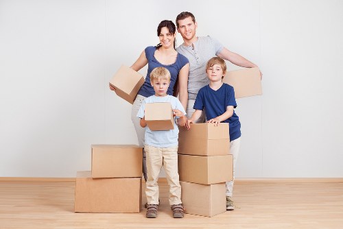 Local moving team handling furniture in South London