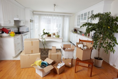 Trained removals staff preparing items for careful transport