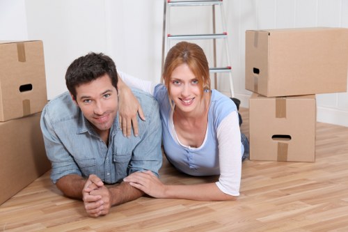 Boxes and household items organised for transport in a moving van