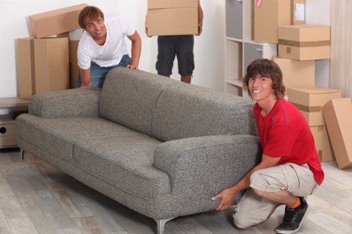 Boxes and furniture placed into rooms during a Southlondon house move