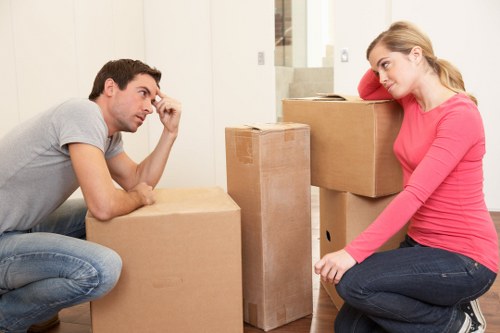 Professional team preparing desks and furniture for an office move