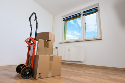 Furniture and belongings prepared for transport during a removal