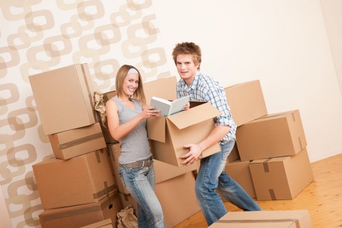 Removal van parked for a home move in Southlondon with boxes and furniture