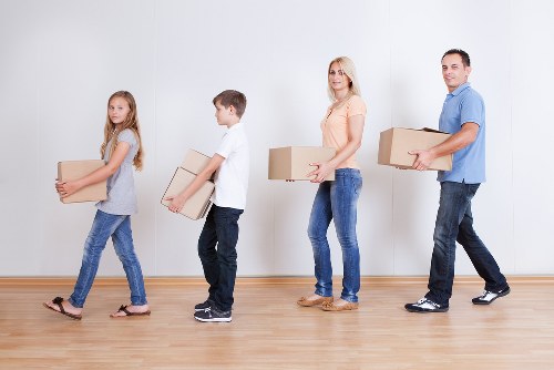 Household boxes and furniture prepared for removal truck hire
